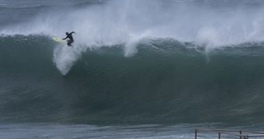 Homes under threat from seven-metre surf