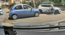 Dashcam footage of a bicycle collision.