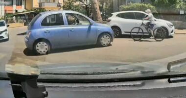 Dashcam footage of a bicycle collision.