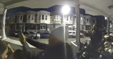 Security camera footage of a nighttime shooting.