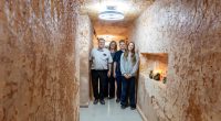 Family posing in their underground home in Coober Pedy, Australia.