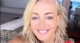 Jackie O Henderson sizzles in plunging red  swimsuit