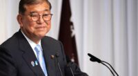 Japan's Ishiba says he'll stay in office to tackle inflation and US tariffs despite election loss