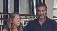 Jennifer Aniston CONFIRMS romance with hunky hypnotist with loving PDA