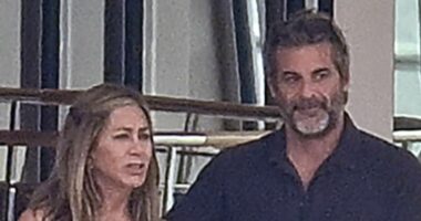 Jennifer Aniston CONFIRMS romance with hunky hypnotist with loving PDA