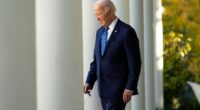 President Biden walking in the White House Rose Garden.