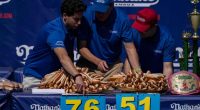 Joey Chestnut reclaims title in Nathan's Famous hot dog eating contest, wins 17th Mustard Belt