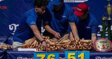 Joey Chestnut reclaims title in Nathan's Famous hot dog eating contest, wins 17th Mustard Belt