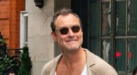 Jude Law, 52, cuts a trendy figure as he steps out to meet pals