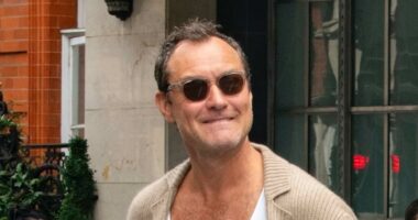 Jude Law, 52, cuts a trendy figure as he steps out to meet pals