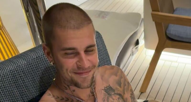 Justin Bieber seems in good spirits as he shares a rare smile