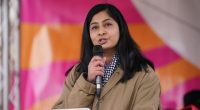 Zarah Sultana speaking at a strike rally.