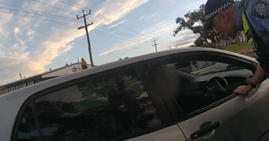 A man has been caught allegedly driving under the influence after police noticed a beer bottle sitting on the roof of his car. ï»¿