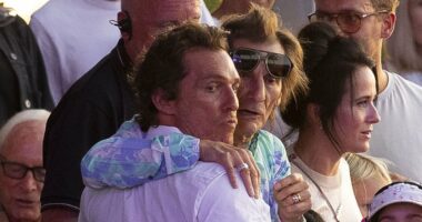 Matthew McConaughey shares a hug with Ronnie Wood at BST Hyde Park
