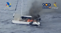 Burning yacht set ablaze by drug smugglers off Tenerife.