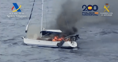 Burning yacht set ablaze by drug smugglers off Tenerife.
