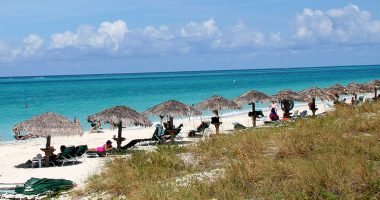 Mystery deepens as body discovered during search for missing American in island paradise