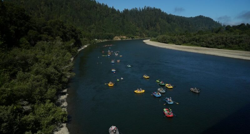 Native American teens kayak major US river to celebrate removal of dams and return of salmon
