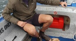 Surfer Steven Payne (pictured, with his dog Poppy) had been travelling Western Australia with his partner Catherine Birch when he was fatally attacked by a great white, an inquest has heard