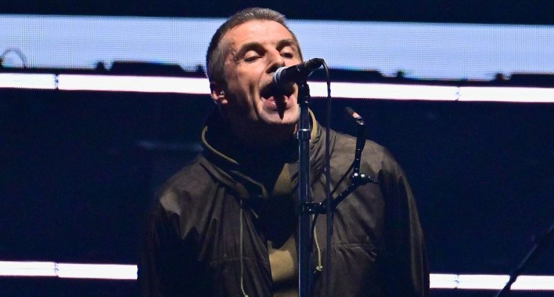 Oasis are back! Liam and Noel Gallagher FINALLY arrive on stage