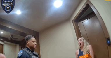 Officers' unexpected pizza delivery goes viral after holiday traffic stop arrest