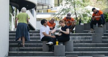 Generic scenes of young professional workers in suits in the CBD
