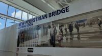 Orlando International Airport’s ‘coming soon’ pedestrian bridge delayed again, contractor payment dispute continues
