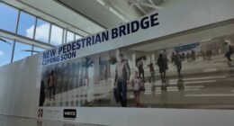 Orlando International Airport’s ‘coming soon’ pedestrian bridge delayed again, contractor payment dispute continues