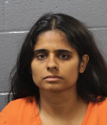 Mugshot of Neha Gupta, accused of murdering her daughter.