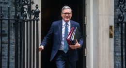 Keir Starmer leaving 10 Downing Street carrying files.