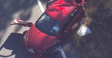 An early-morning police chase has ended with a man wanted over alleged domestic violence ejected from his car and fighting for his life in a Sydney hospital.﻿