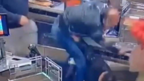 A police employee has been charged after a brawl inside a Woolworths supermarket in Western Sydney.