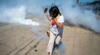 Protesters and federal agents clash during raid at Southern California farm