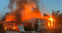 Firefighters battling a blaze at a building in Sumy, Ukraine.