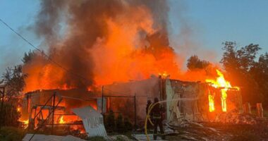 Firefighters battling a blaze at a building in Sumy, Ukraine.