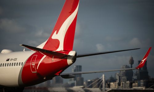 A Qantas A380 aircraft passes Gate 20 at The Beach, Mascot on the perimiter of Sydney Airport. Qantas.