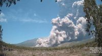 Residents wear masks as volcanic ash blankets villages near erupting Indonesian volcano