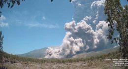 Residents wear masks as volcanic ash blankets villages near erupting Indonesian volcano