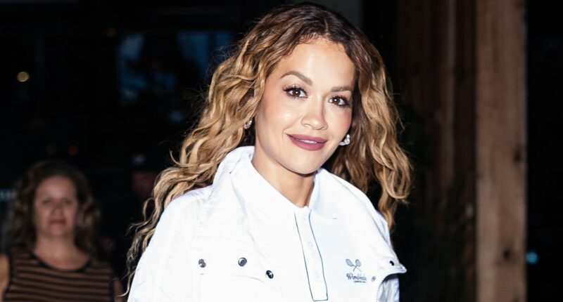 Rita Ora puts on a stylish display in Ralph Lauren white skater skirt