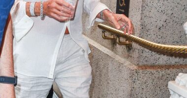 Rod Stewart cut a dapper figure as he stepped out in New York on Friday flashing a glimpse of his bronzed chest in a loose fitting open-necked white shirt, which he paired with linen shorts