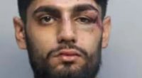 Mugshot of Ishaan Sharma with a black eye and other injuries.