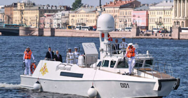 Russia scales down celebrations honoring its navy as Ukraine launches more drone attacks