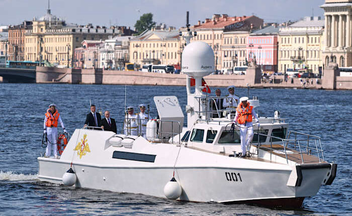 Russia scales down celebrations honoring its navy as Ukraine launches more drone attacks