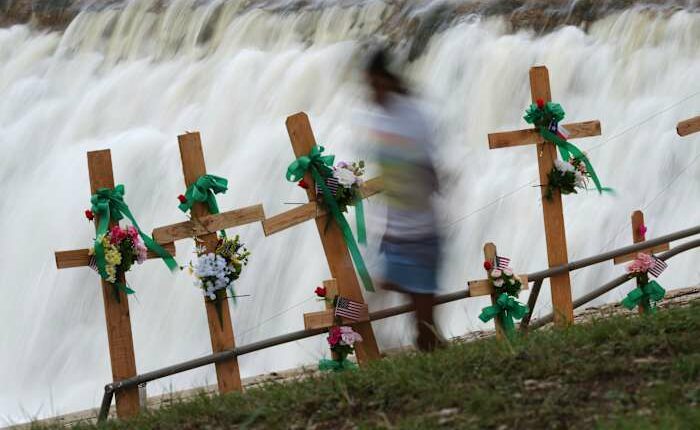 Search for Texas flood victims to resume after pause due to heavy rains