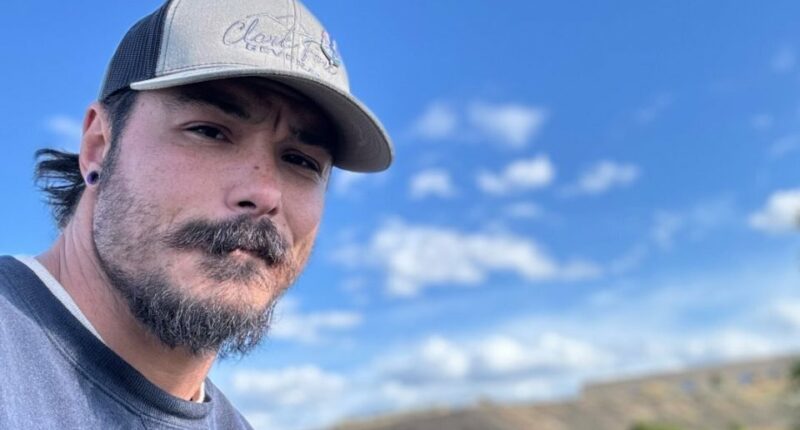 Travis Decker, wanted for murder.