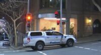 Sydney hotel worker allegedly stabbed in the face with scissors by colleague