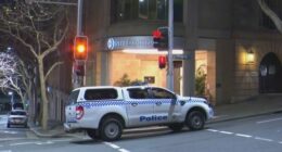 Sydney hotel worker allegedly stabbed in the face with scissors by colleague
