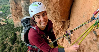 Woman rock climbing.