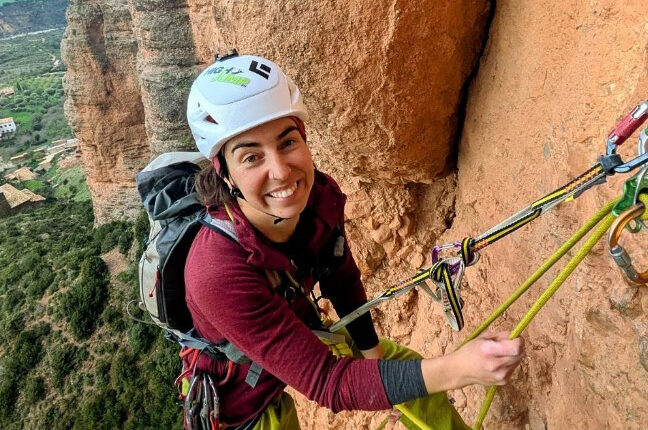 Woman rock climbing.