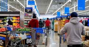 Shoppers in a Walmart store.
